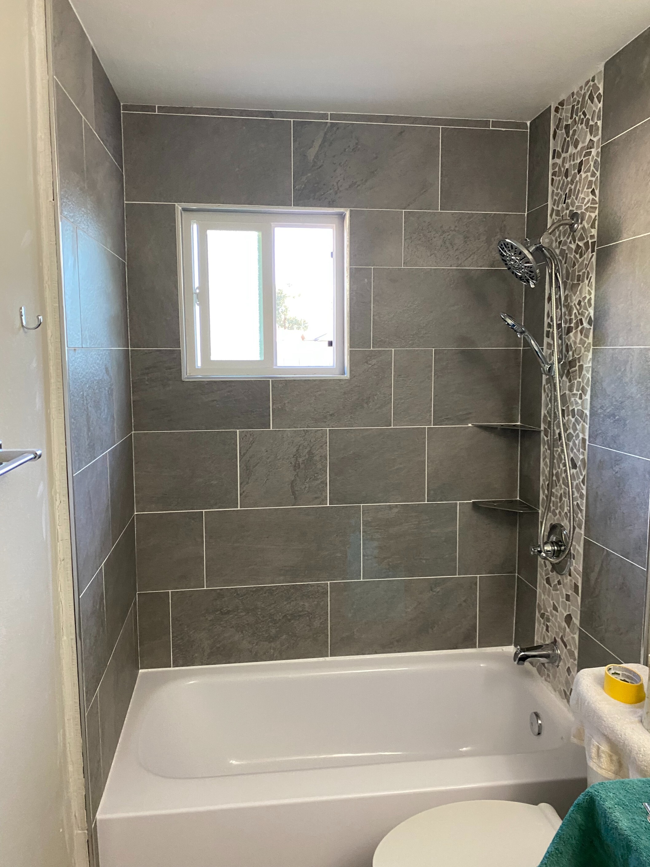 Gallery Image : Tub and tire installed in new bathroom